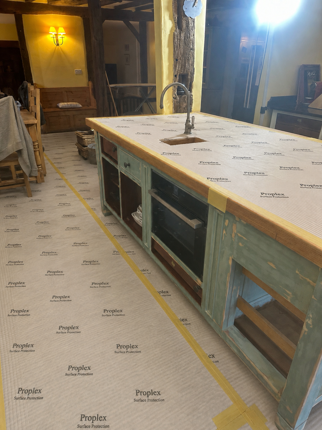 Kitchen protected before painting