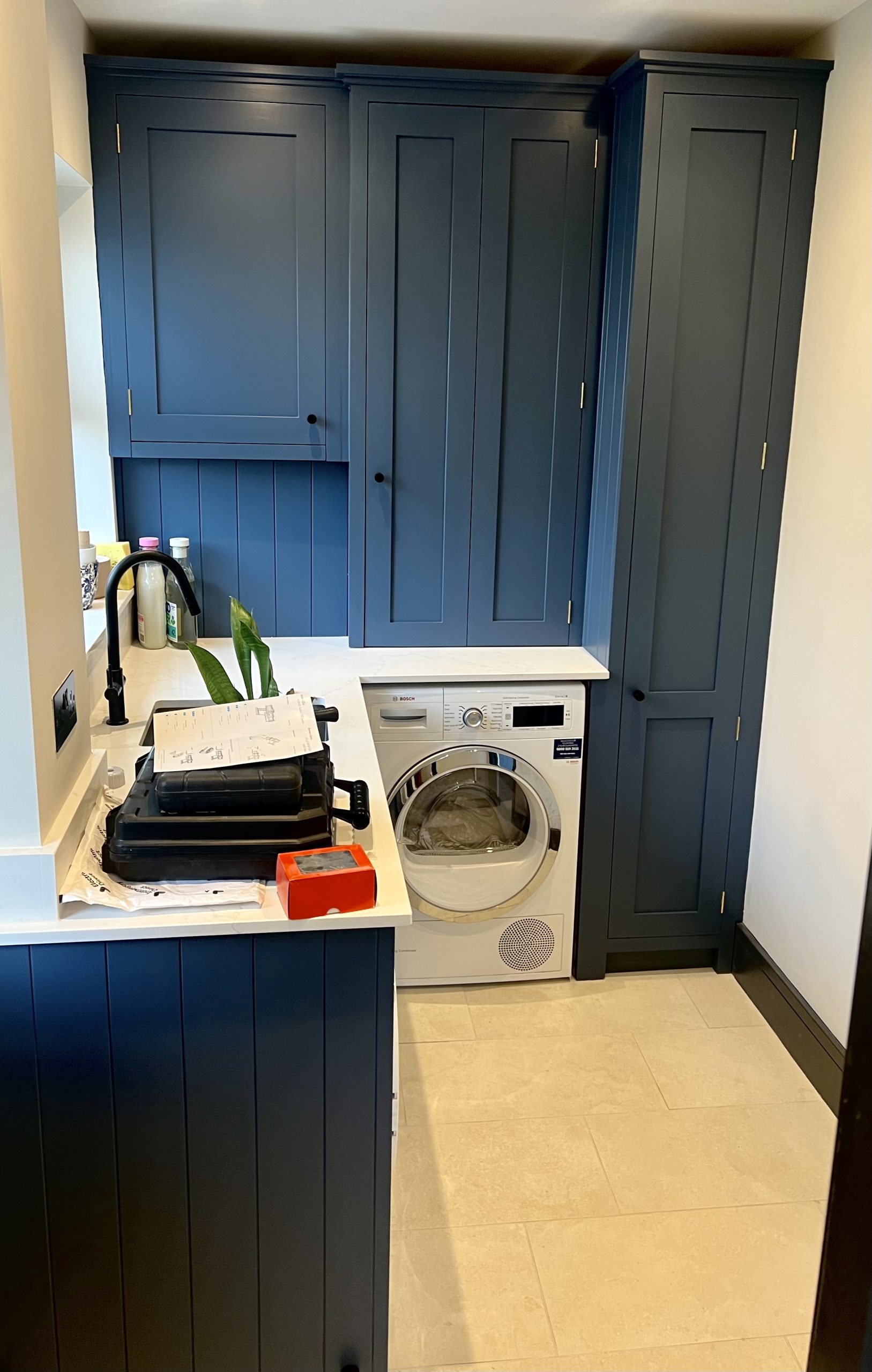 Painted utility room cabinetry