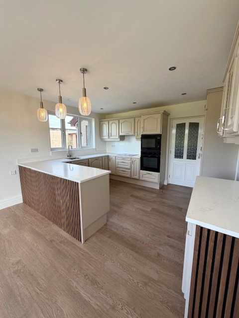 Finished luxury hand-painted kitchen in the North West by JS Decor