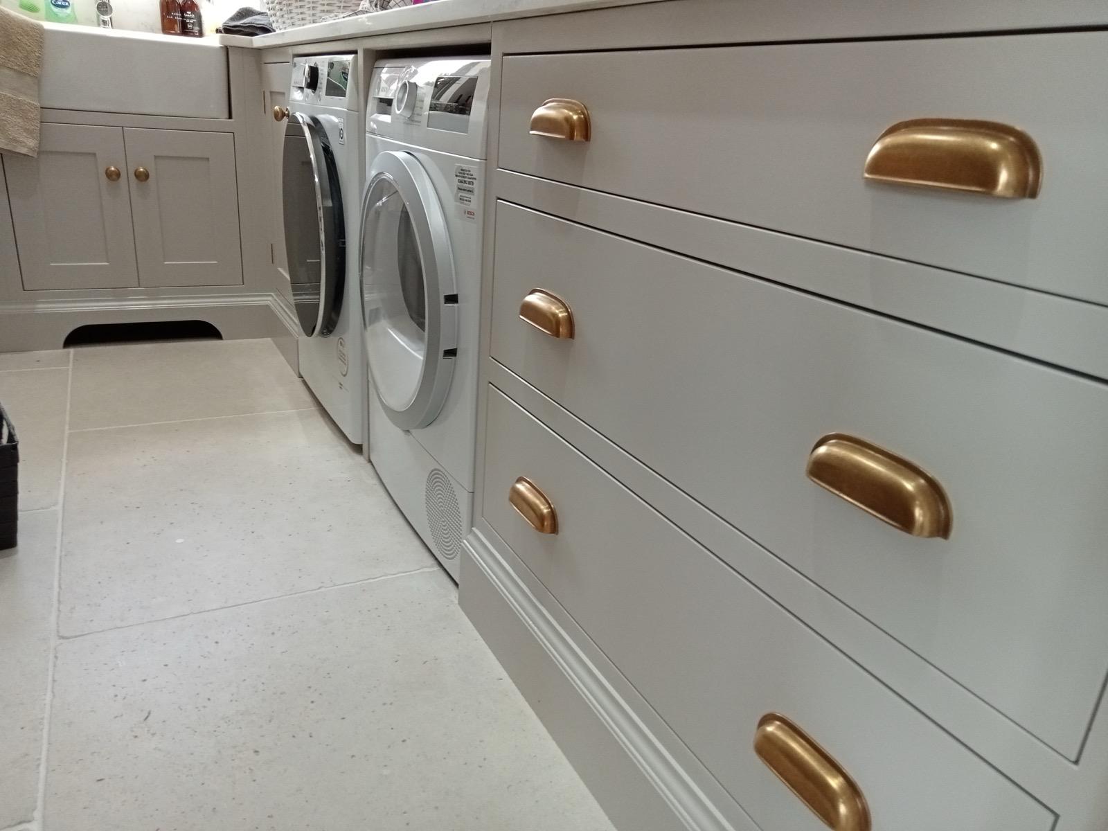 Close up of draws with brass cup handles
